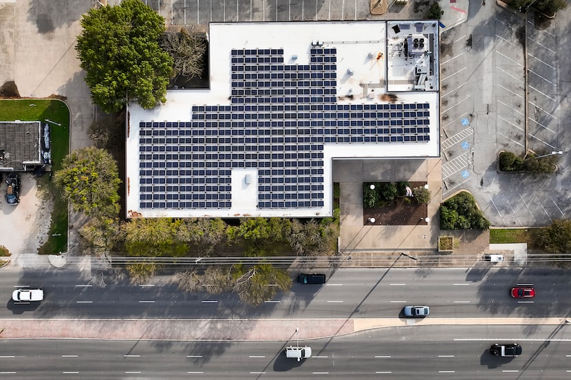 Solar panels are seen on the roof of the West Dallas Branch Library on Sunday, Nov. 30,...