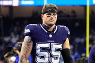 Dallas Cowboys linebacker Logan Wilson (55) walks to the locker room after their 44-30 loss...