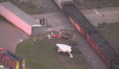 18-wheeler struck by train along US-290