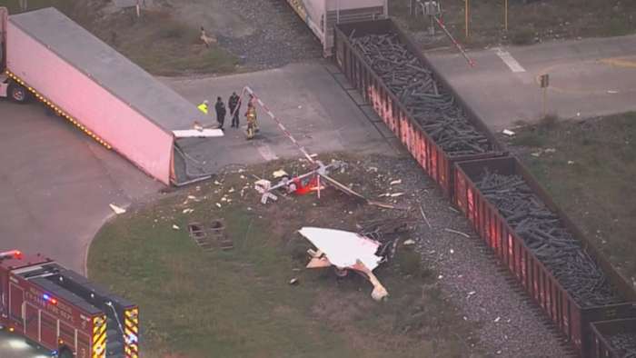 18-wheeler struck by train along US-290