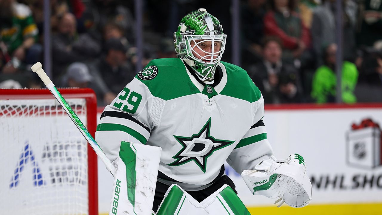 Dallas Stars goaltender Jake Oettinger (29) defends his net against the Minnesota Wild during the second period of an NHL hockey game Thursday, Dec. 11, 2025, in St. Paul, Minn. (AP Photo/Matt Krohn)