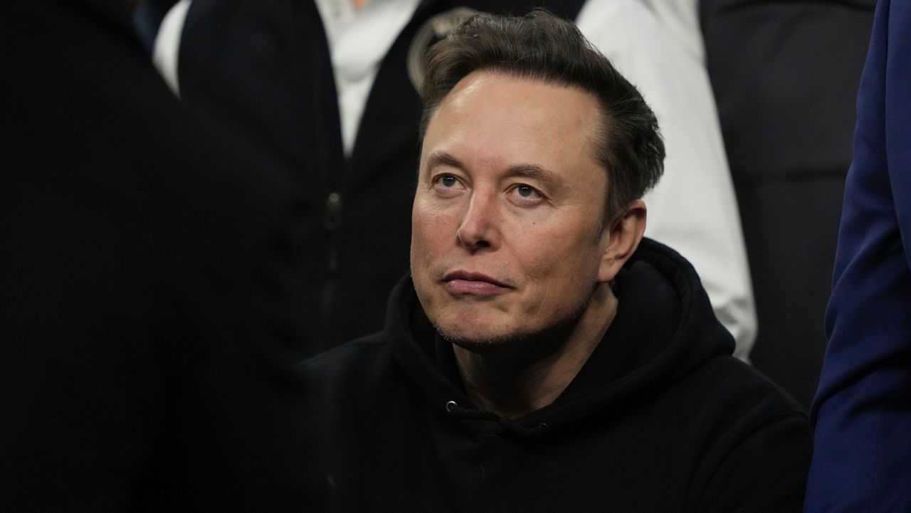 Elon Musk attends the finals for the NCAA wrestling championship, Saturday, March 22, 2025, in Philadelphia. (AP Photo/Matt Rourke)