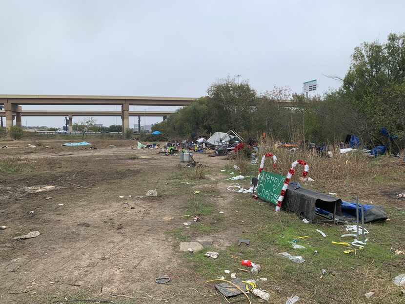 A sign of the coming holiday in the field behind the Shell station off Walnut Hill Lane in...