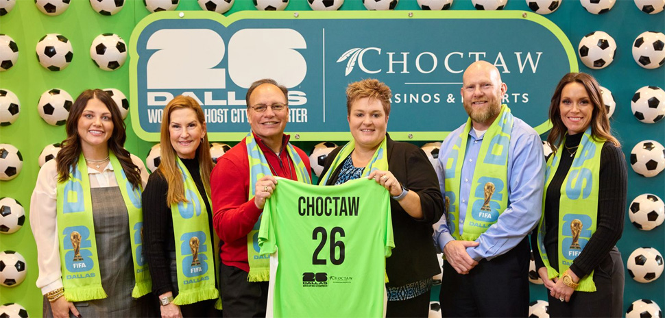Erica Kosemund, Chief Brand Officer, Choctaw Nation of Oklahoma; Gillian Breidenbach, Chief Partnership Officer, North Texas FWC Organizing Committee; Chief Gary Batton, Chief of Choctaw Nation of Oklahoma; Monica Paul, Executive Director of Dallas Sports Commission and President of North Texas FWC Organizing Committee; John Hobbs, Senior Executive Officer of Communications, Choctaw Nation of Oklahoma; and Heidi Grant, Senior Executive Officer of Commerce Administration, Choctaw Nation of Oklahoma, celebrate Choctaw Casinos & Resorts becoming an Official Dallas World Cup 2026 Host City Supporter. [Photo: North Texas FWC Organizing Committee/Choctaw Casinos & Resorts]