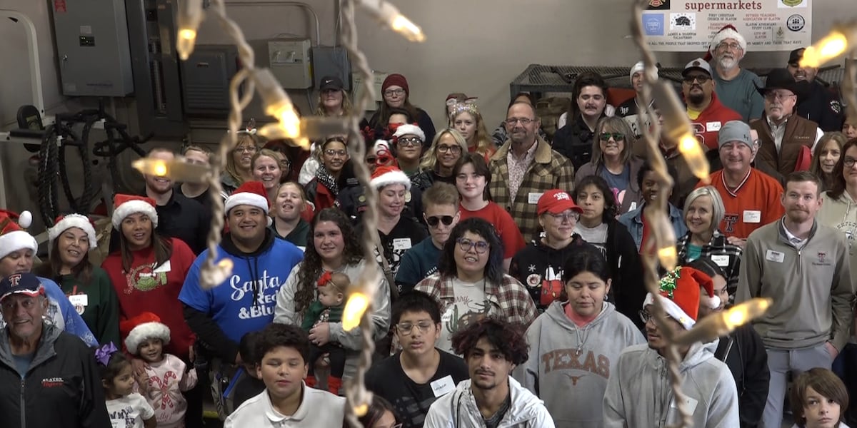 Santa Red and Blue brings Christmas joy to Slaton families