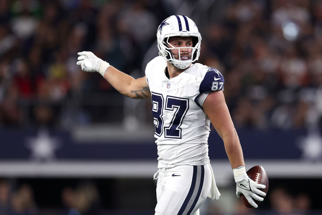 ARLINGTON, TEXAS - DECEMBER 09: Jake Ferguson #87 of the Dallas Cowboys celebrates a first down against the Cincinnati Bengals during the third quarter in the game at AT&T Stadium on December 09, 2024 in Arlington, Texas. (Photo by Sam Hodde/Getty Images)