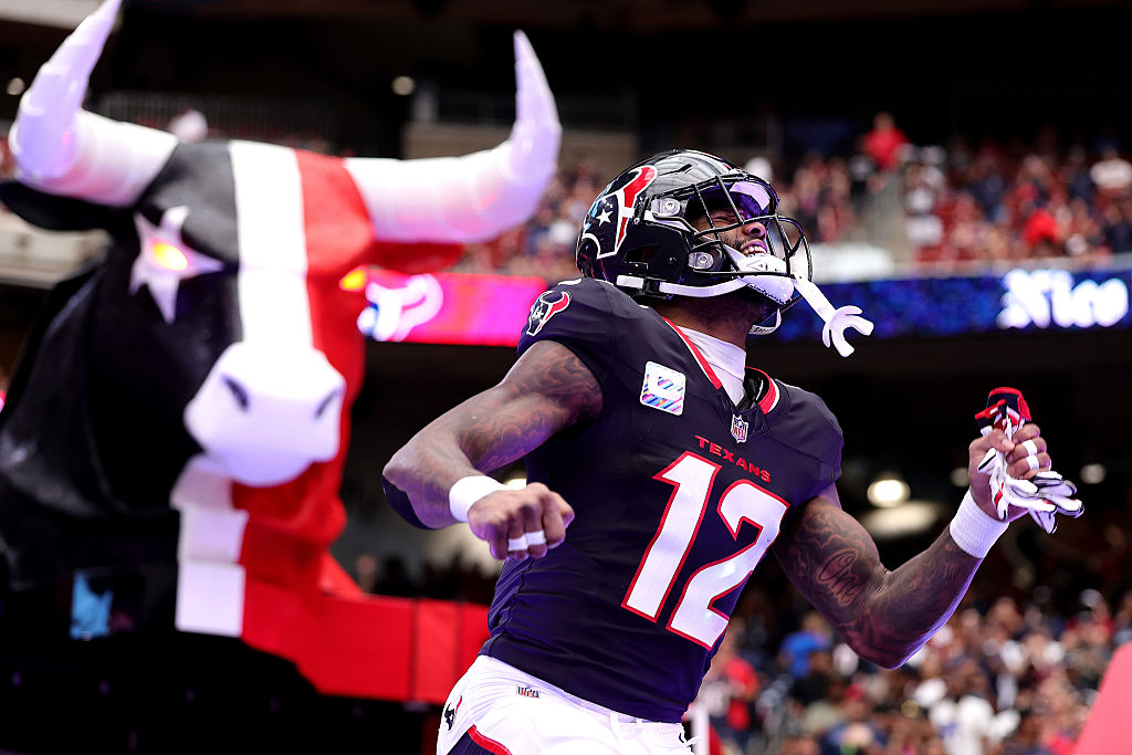 HOUSTON, TEXAS - SEPTEMBER 28: Nico Collins #12 of the Houston Texans takes the field during player introductions before the game against the Tennessee Titans at NRG Stadium on September 28, 2025 in Houston, Texas. (Photo by Alex Slitz/Getty Images)
