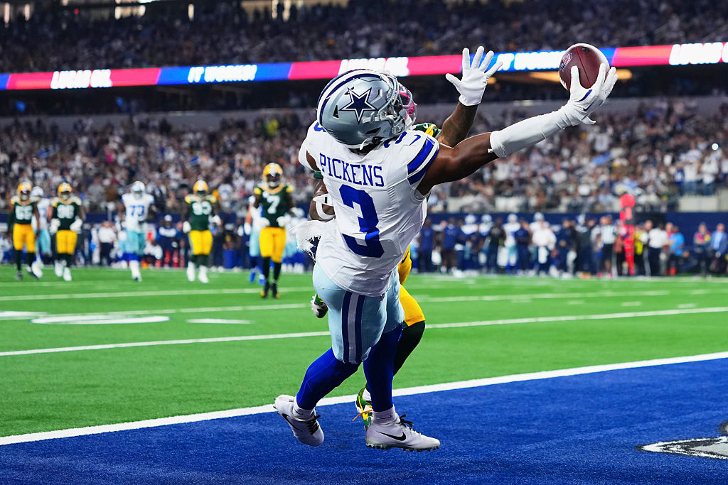 ARLINGTON, TX - SEPTEMBER 28: George Pickens #3 of the Dallas Cowboys dives for the ball against the Green Bay Packers during an NFL football game at AT&T Field on September 28, 2025 in Arlington, Texas. (Photo by Cooper Neill/Getty Images)