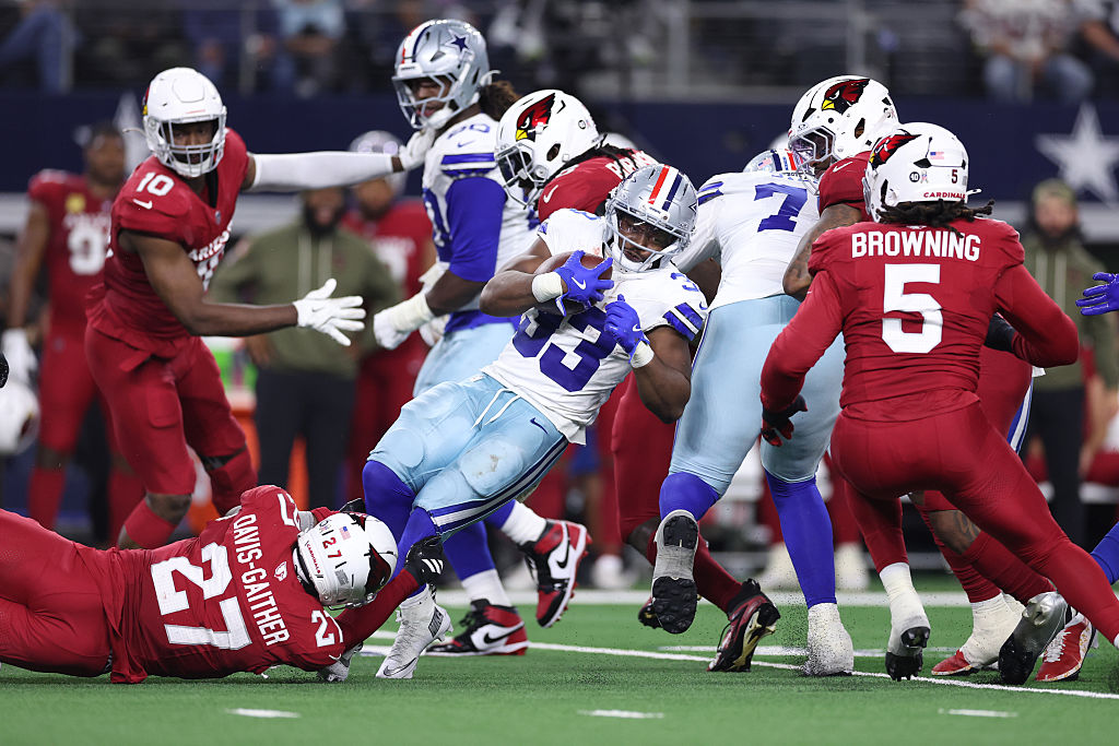 ARLINGTON, TEXAS - NOVEMBER 03: Javonte Williams #33 of the Dallas Cowboys rushes against PJ Mustipher #79 of the Arizona Cardinals during the third quarter in the game at AT&T Stadium on November 03, 2025 in Arlington, Texas. (Photo by Sam Hodde/Getty Images)