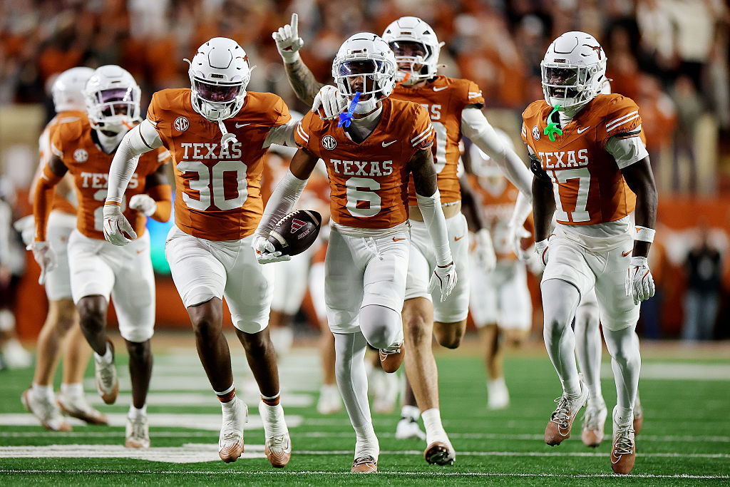AUSTIN, TEXAS - NOVEMBER 28: Kobe Black #6 of the Texas Longhorns celerbates a interception during the fourth quarter of a game against the Texas A&M Aggies at Darrell K Royal-Texas Memorial Stadium on November 28, 2025 in Austin, Texas. (Photo by Alex Slitz/Getty Images)
