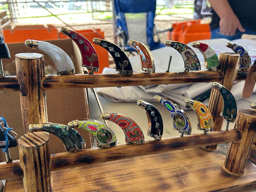 Sheaths for cockfighting knives were on sale at the El Gallo Show in Cleveland, Texas, on...