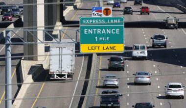 Drivers make their way on an a split highway in Irving, Texas, Friday, March 3, 2023.