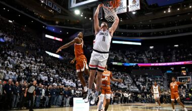 UConn forward Alex Karaban (11) dunks in the first half of a game against Texas Friday night.