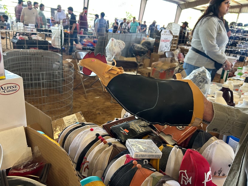A hand puppet typically used for training in cockfighting was for sale at El Gallo Show...