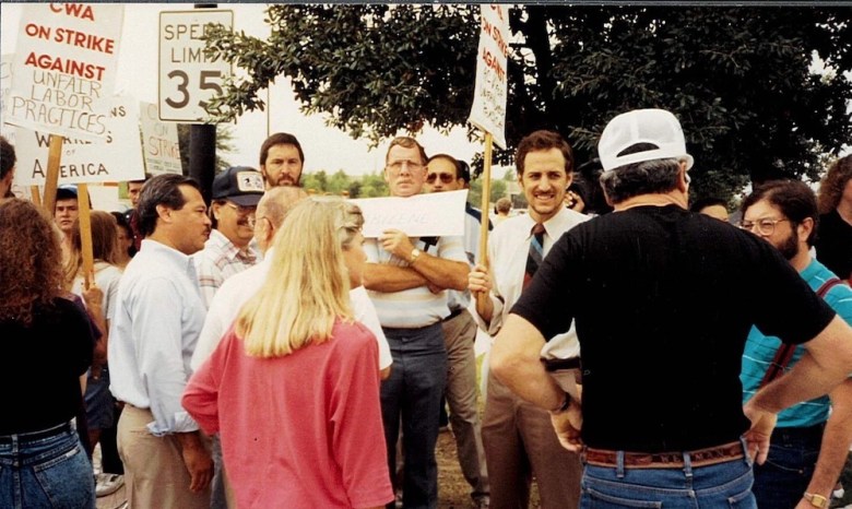 Levy stands on the picket lines in the 1990s.
