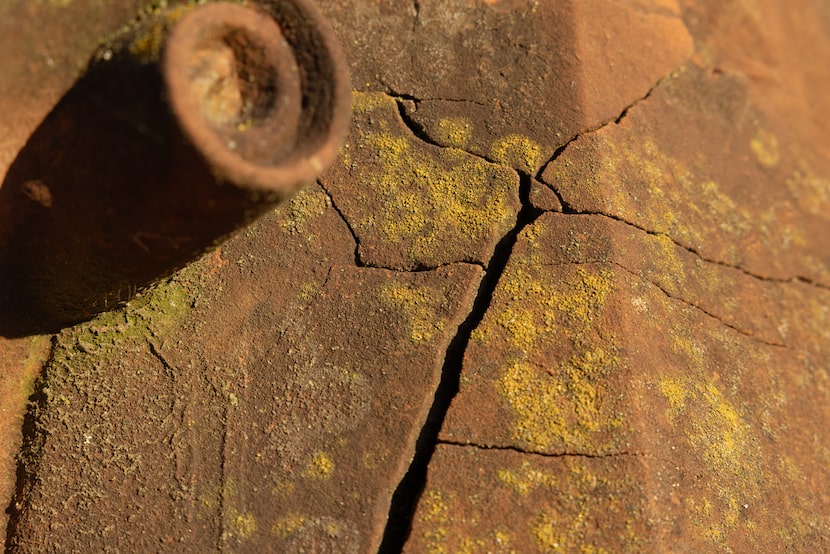 A red sandstone tombstone is seen at the Oakland Cemetery Nov. 25, 2025 in South Dallas. 