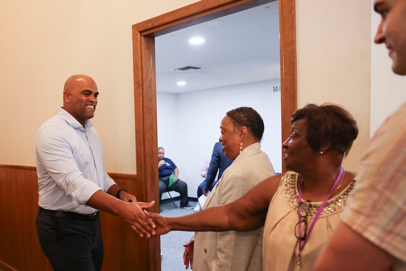U.S. Senate candidate and voting rights lawyer Colin Allred greets the crowd upon entering...