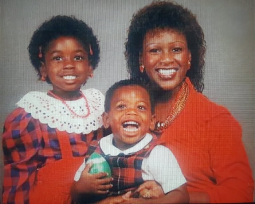 David Overstreet II (center) poses for a family portrait with his sister Dayetta and mother...