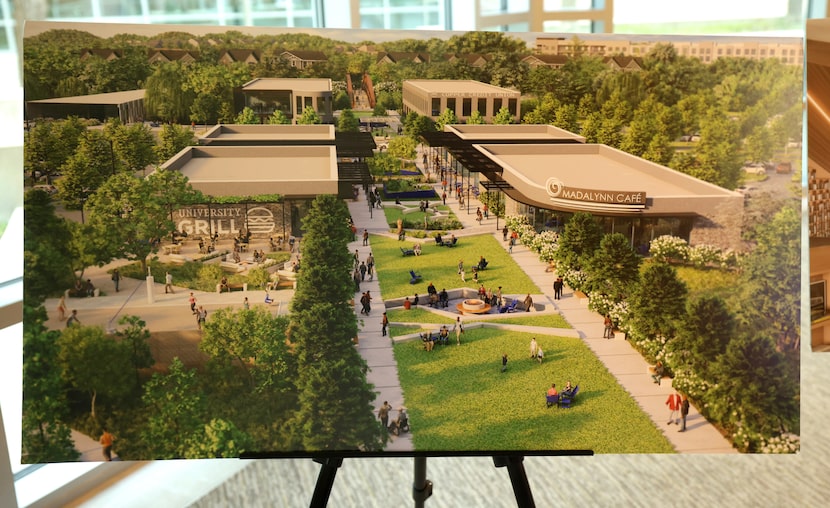 A rendering on display of a future 90-acre development during Russell Glen Company's...