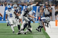Dallas Cowboys kicker Brandon Aubrey (17) applies a hit on Detroit Lions' Tom Kennedy on a...