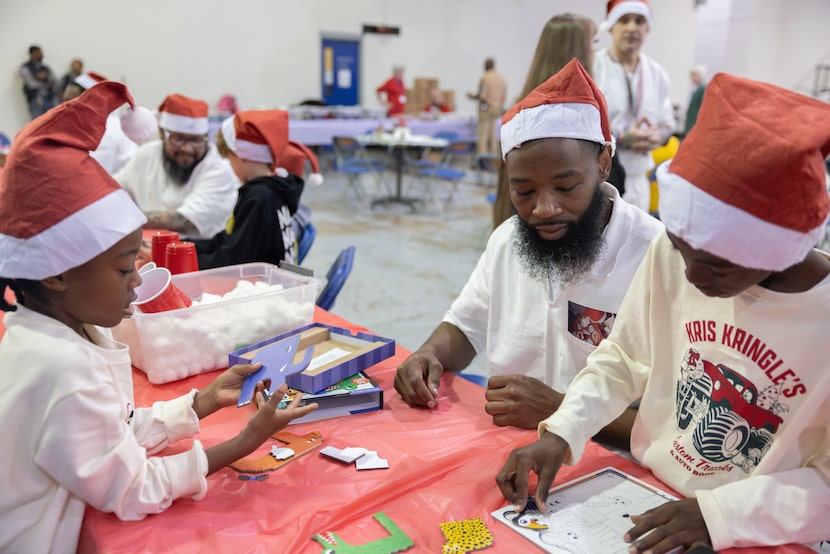 Larry Jr. Taylor,  an inmate at the Sanders Estes Unit prison in Venus, plays with his...