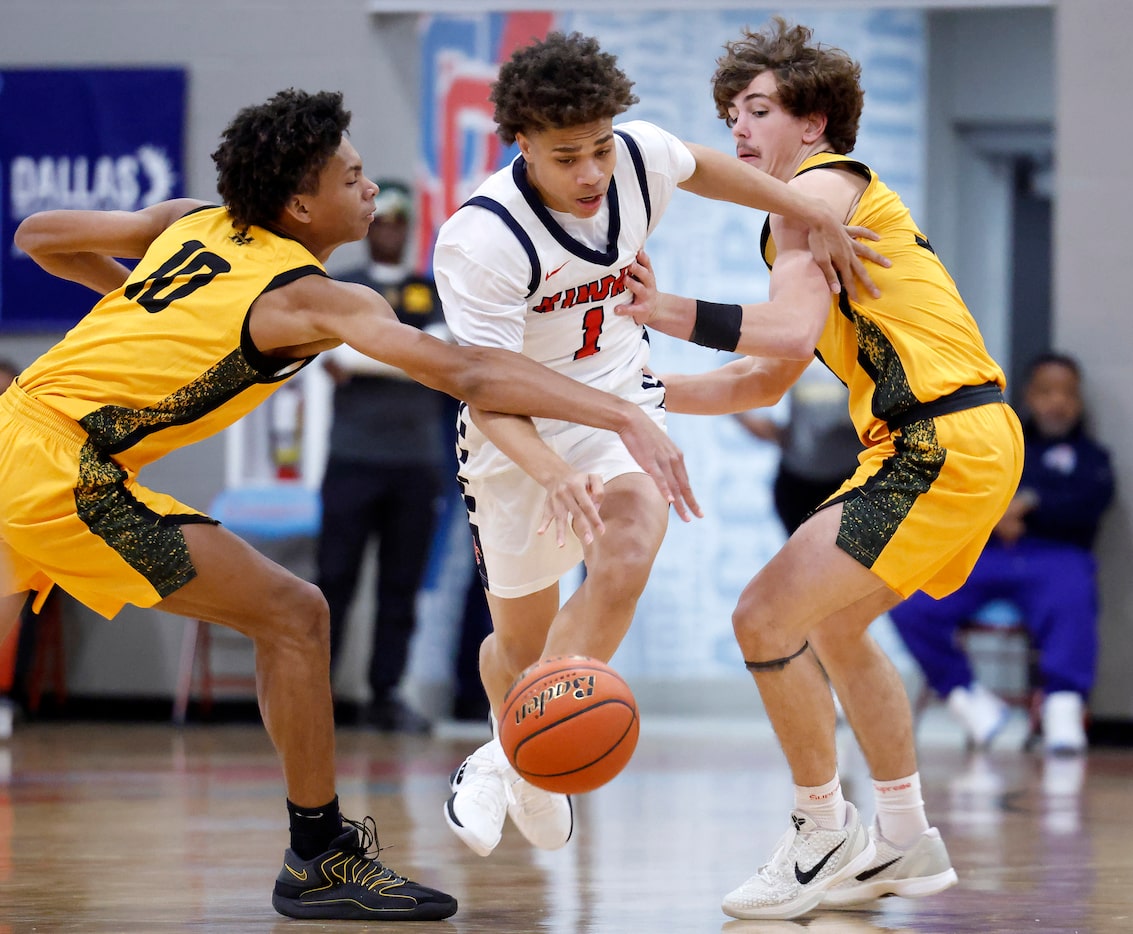 Frisco Memorial guards James Johnson III (10) and Dylan Steffe (3) double team Kimball guard...