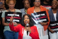 U.S. Rep. Jasmine Crockett addresses a rally at Antioch Fellowship Church on Thursday, Aug....