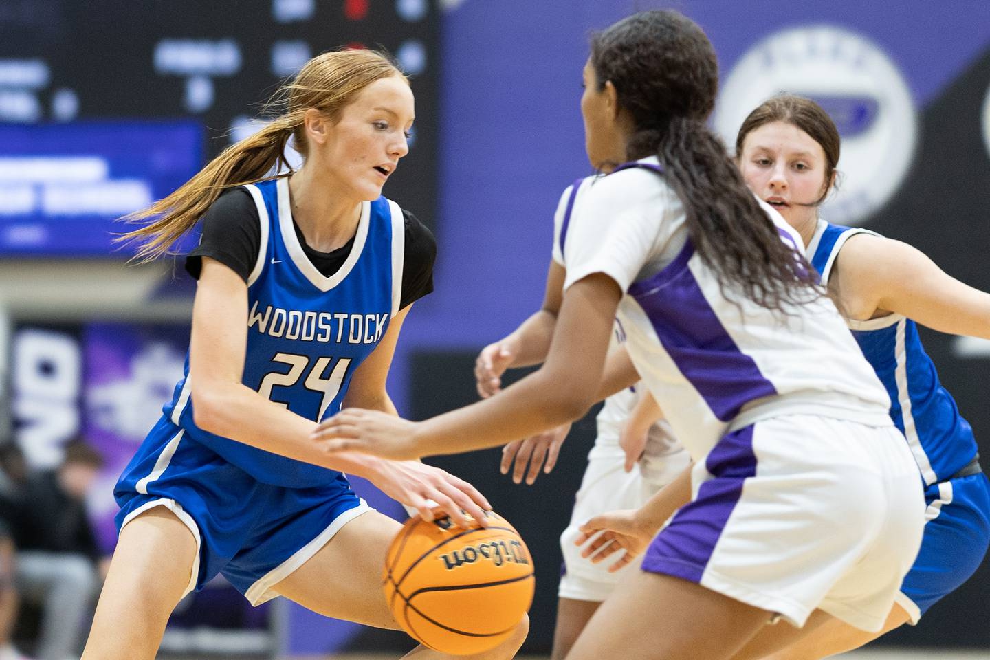 Woodstock's Aiyana Fourdyce (24) dribbles the ball during Monday's game at Plano.