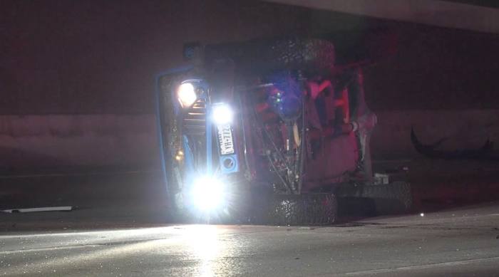Driver with flat tire hit, killed on North Freeway