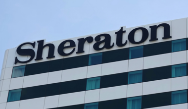 Detailed close-up of a Sheraton hotel building exterior