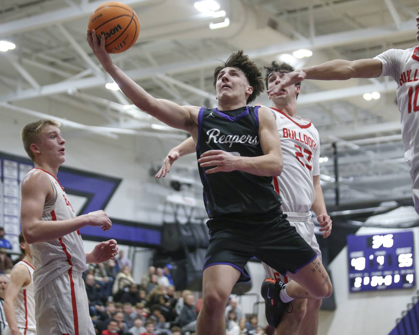 Plano's Ethan Taxis (3) puts up an acrobatic shot during their Plano Christmas Classic basketball game between Streator at Plano Friday, Dec 26, 2025 in Plano.
