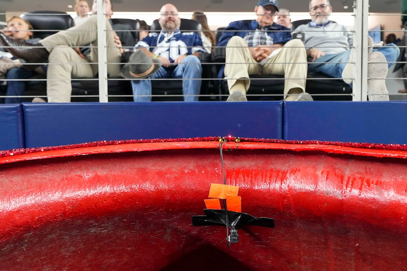 A small video camera is seen inside one of the end zone Salvation Army kettles during the...