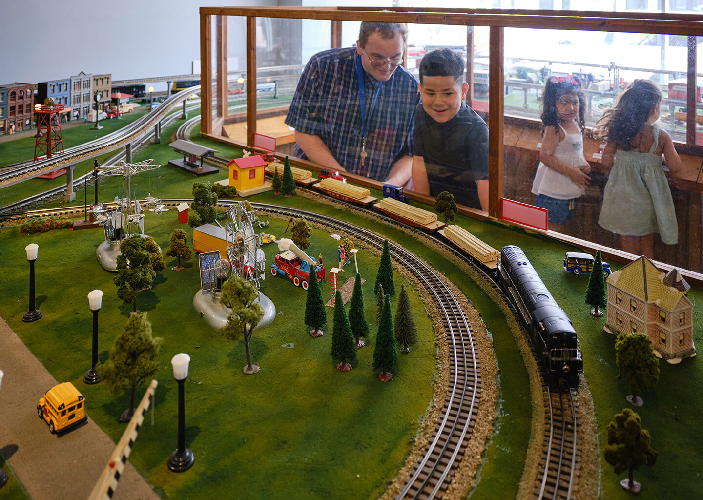 Children Viewing a Model Train Exhibit