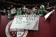 Philadelphia Eagles fans cheer after a win against the Washington Commanders following an...