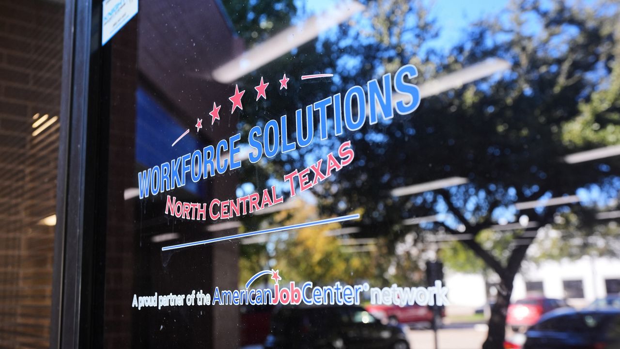 The front entry of a Workforce Solutions of North Central Texas office is shown, Thursday, Oct. 30, 2025, in Plano, Texas. (AP Photo/Tony Gutierrez)