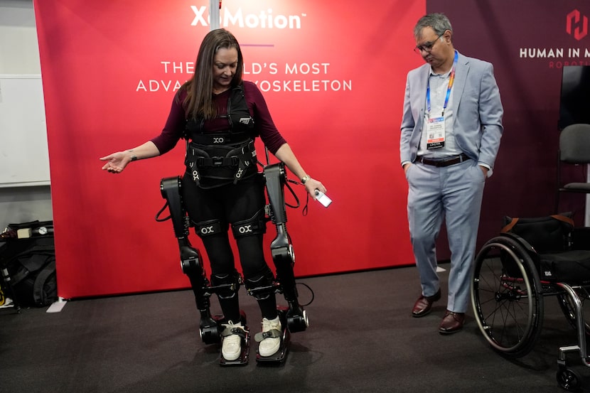 Chloe Angus, director of Lived Experience at Human in Motion Robotics and paraplegic, stands...