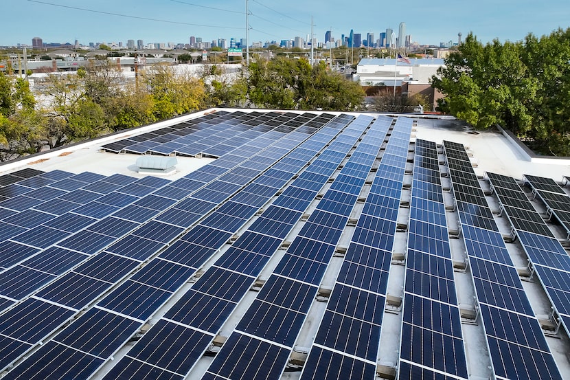Solar panels are seen on the roof of the West Dallas Branch Library on Sunday, Nov. 30,...