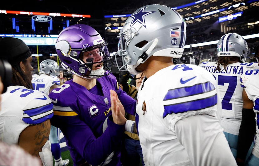 Dallas Cowboys quarterback Dak Prescott (4) congratulates Minnesota Vikings quarterback J.J....