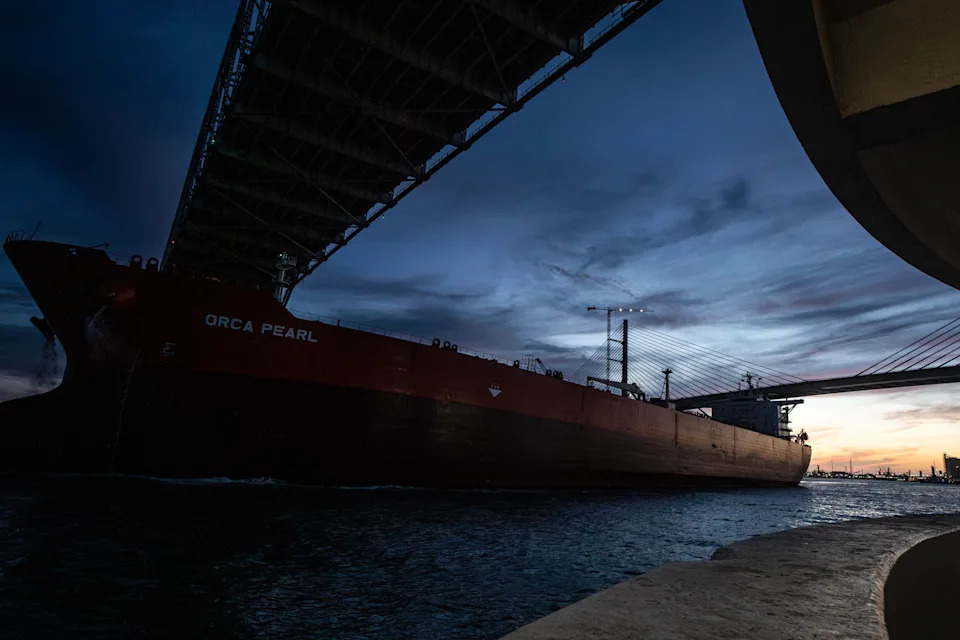 The Orca Pearl, a Panamanian crude oil vessel, is taxied by tugboat under the new and old Harbor Bridges which stretch over the Port of Corpus Christi ship channel on Monday, March 17, 2025, in Corpus Christi, Texas.
