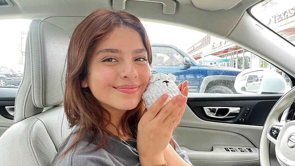 Camila Mendoza Olmos holding a stuffed animal