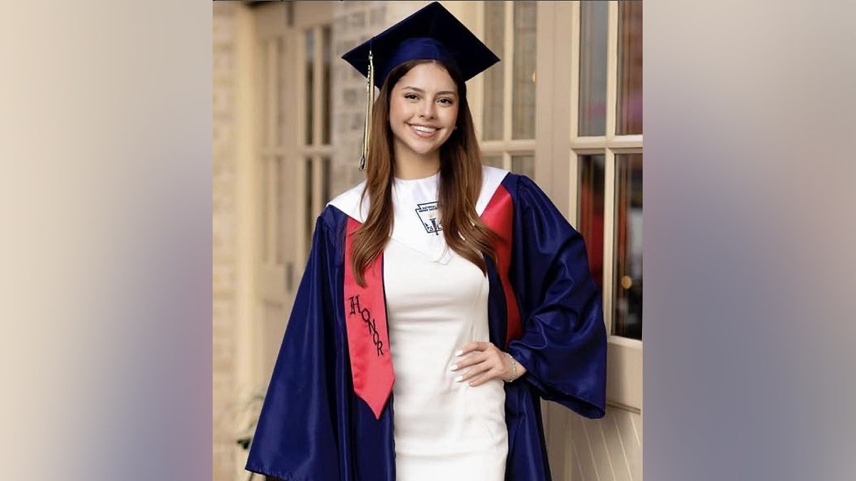 Camila Olmos in her graduation cap and gown.