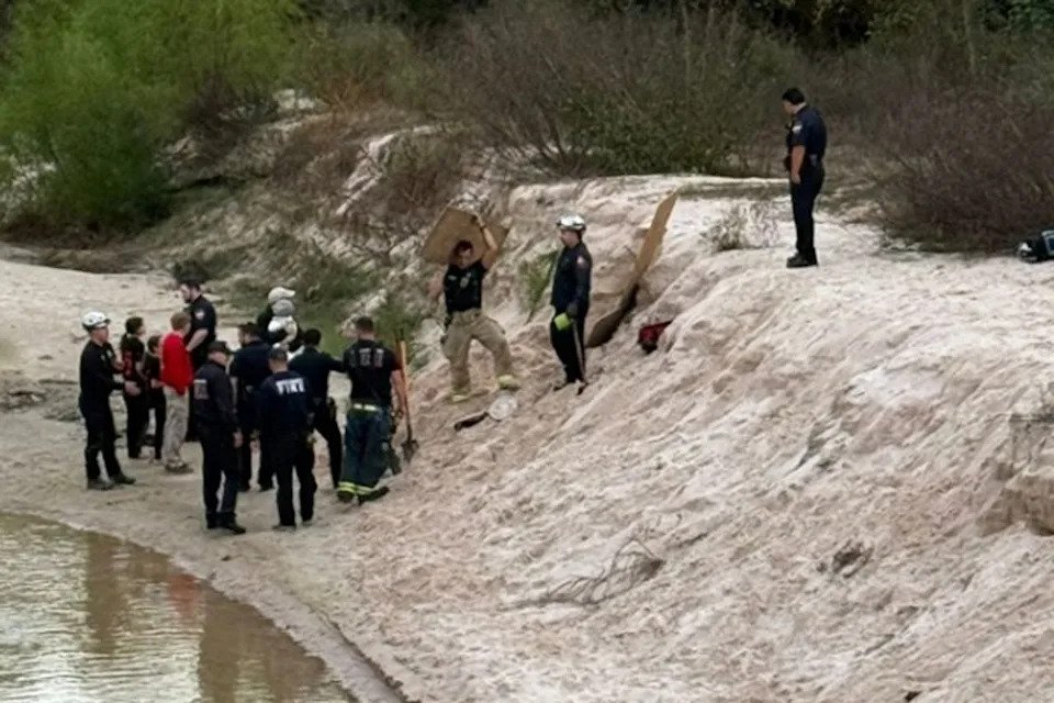 The Woodlands Fire Department The site of the sand hole collapse in The Woodlands, Texas