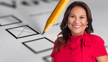 A picture of Veronica Escobar over a generic ballot with a pencil checking a choice.