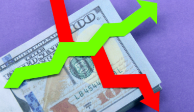 A illustration of money with a green arrow going up and a red arrow going down.