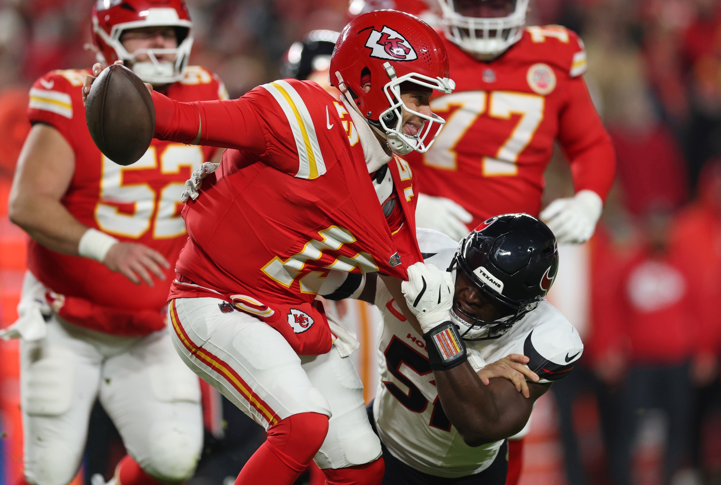 KANSAS CITY, MISSOURI - DECEMBER 07: Patrick Mahomes #15 of the Kansas City Chiefs is tackled after his reception by Will Anderson Jr. #51 of the Houston Texans during the first quarter at Arrowhead Stadium on December 07, 2025 in Kansas City, Missouri. (Photo by Jamie Squire/Getty Images)