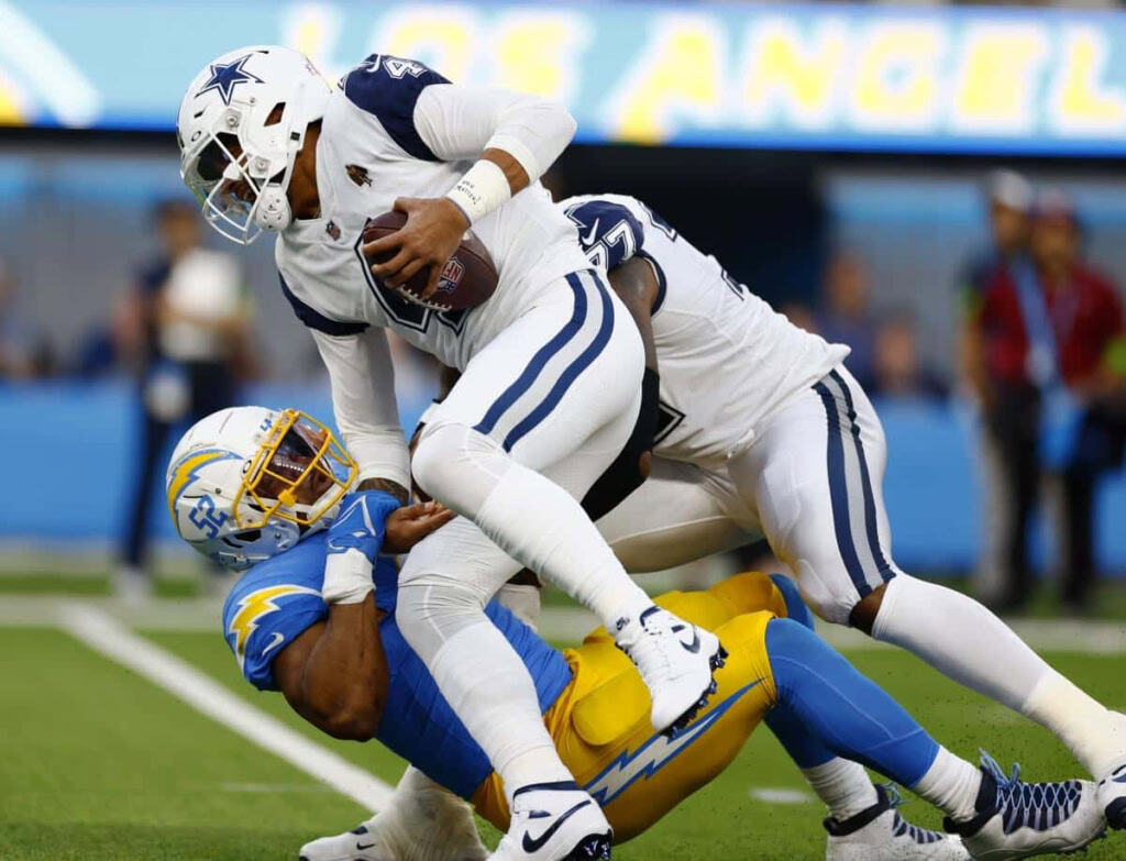 Dallas Cowboys QB Dak Prescott sacked by Chargers DE Khalil Mack