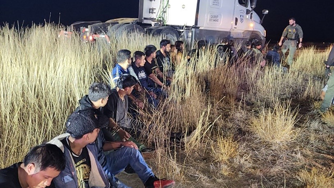 Texas man arrested after 23 migrants found hidden in truck during stop: police