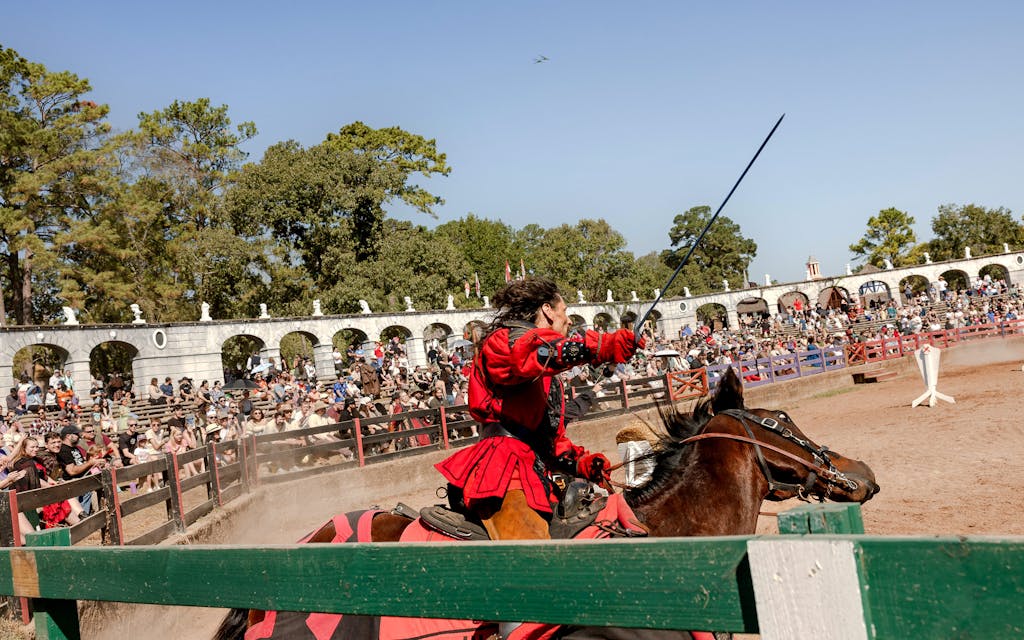A Spanish knight rides his horse during the joisting performance at the main arena.