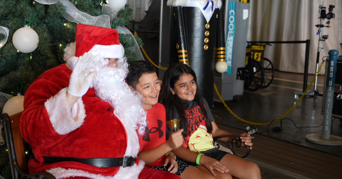 USS Lexington Museum celebrates Christmas with visit from Santa Claus