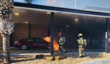 Vehicle fire at Chick-fil-A contained by firefighters